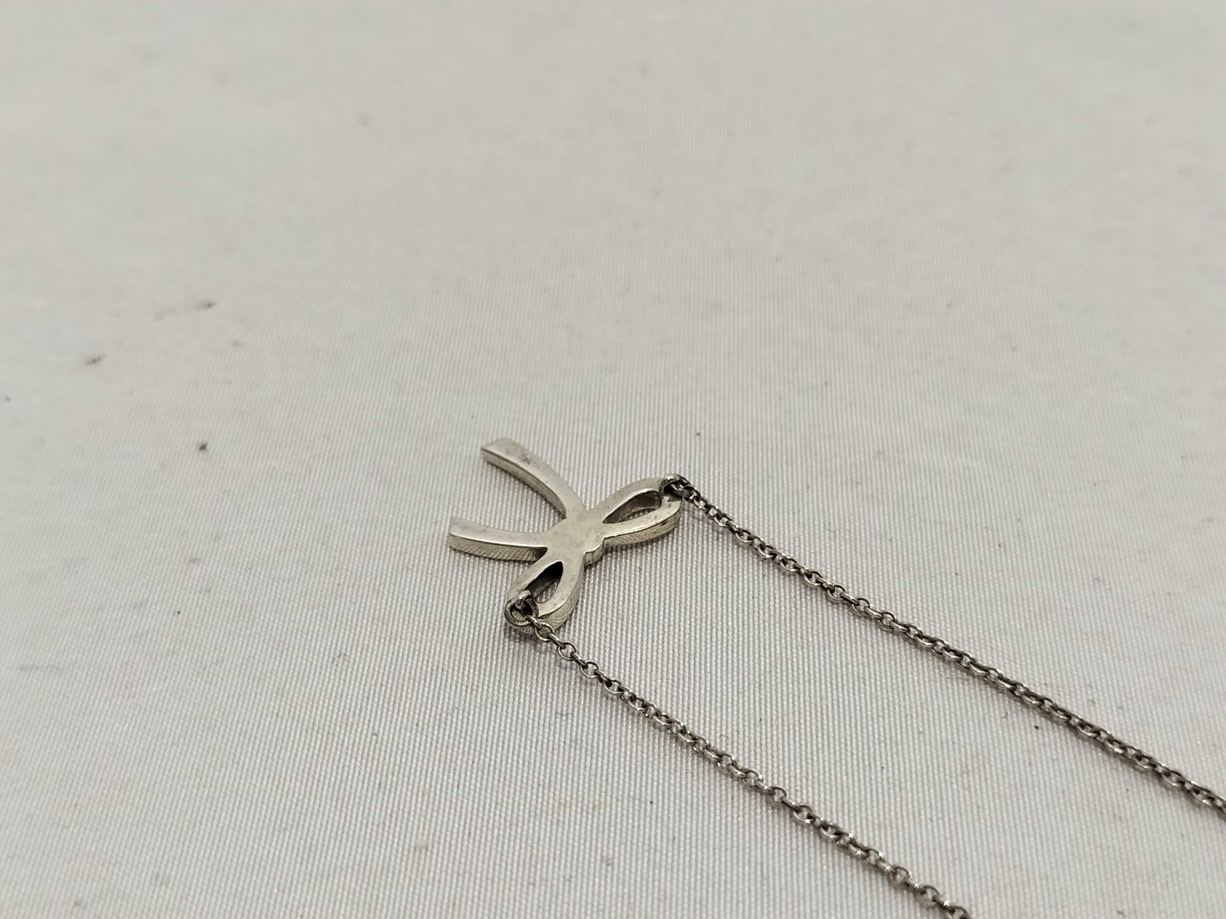 【水曜終了】(10221_0394)Tiffany&Co. リボンモチーフ 925刻印 ネックレス