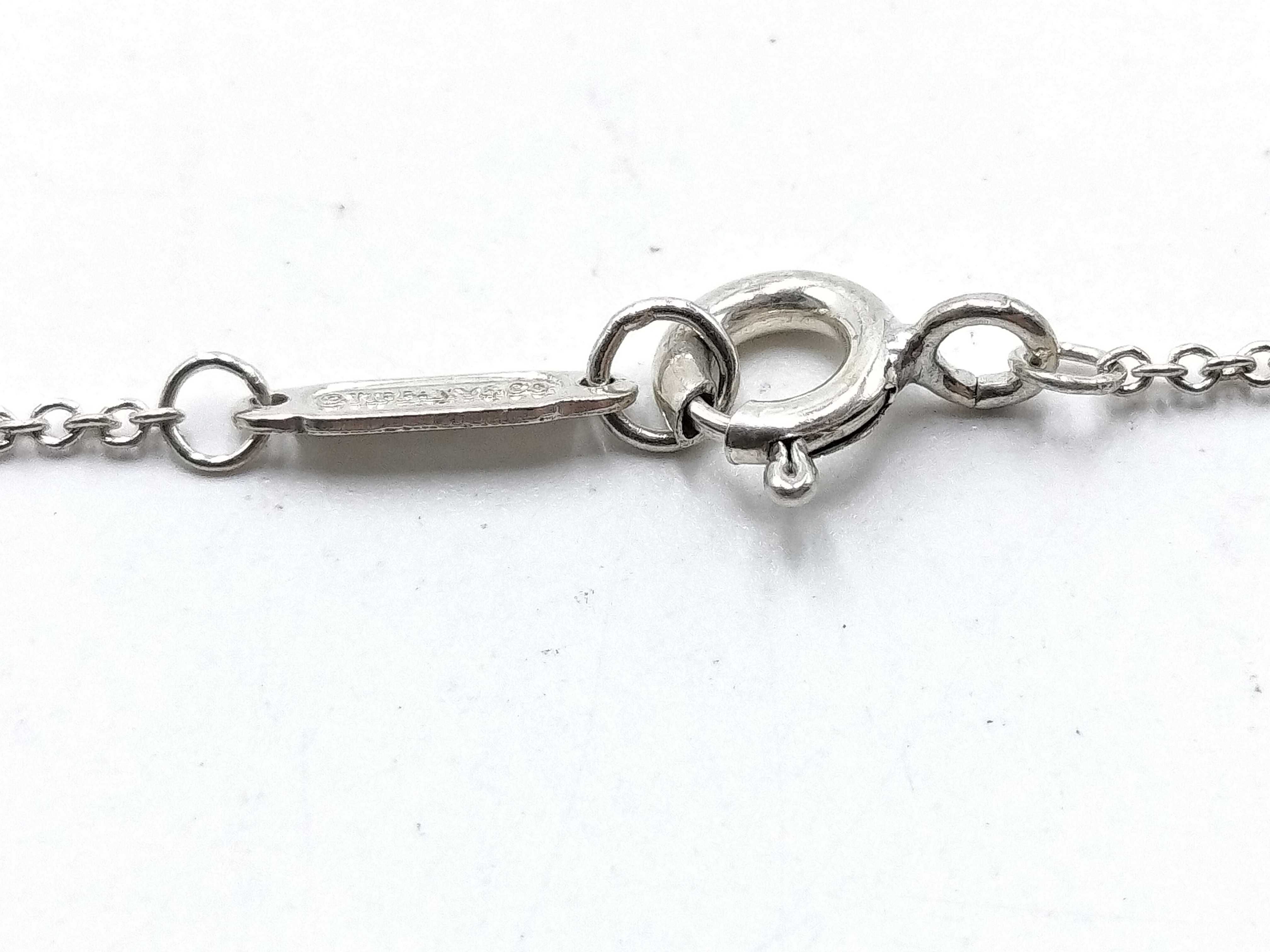 【水曜終了】(10221_0427)Tiffany&Co. インターロッキング ネックレス リング