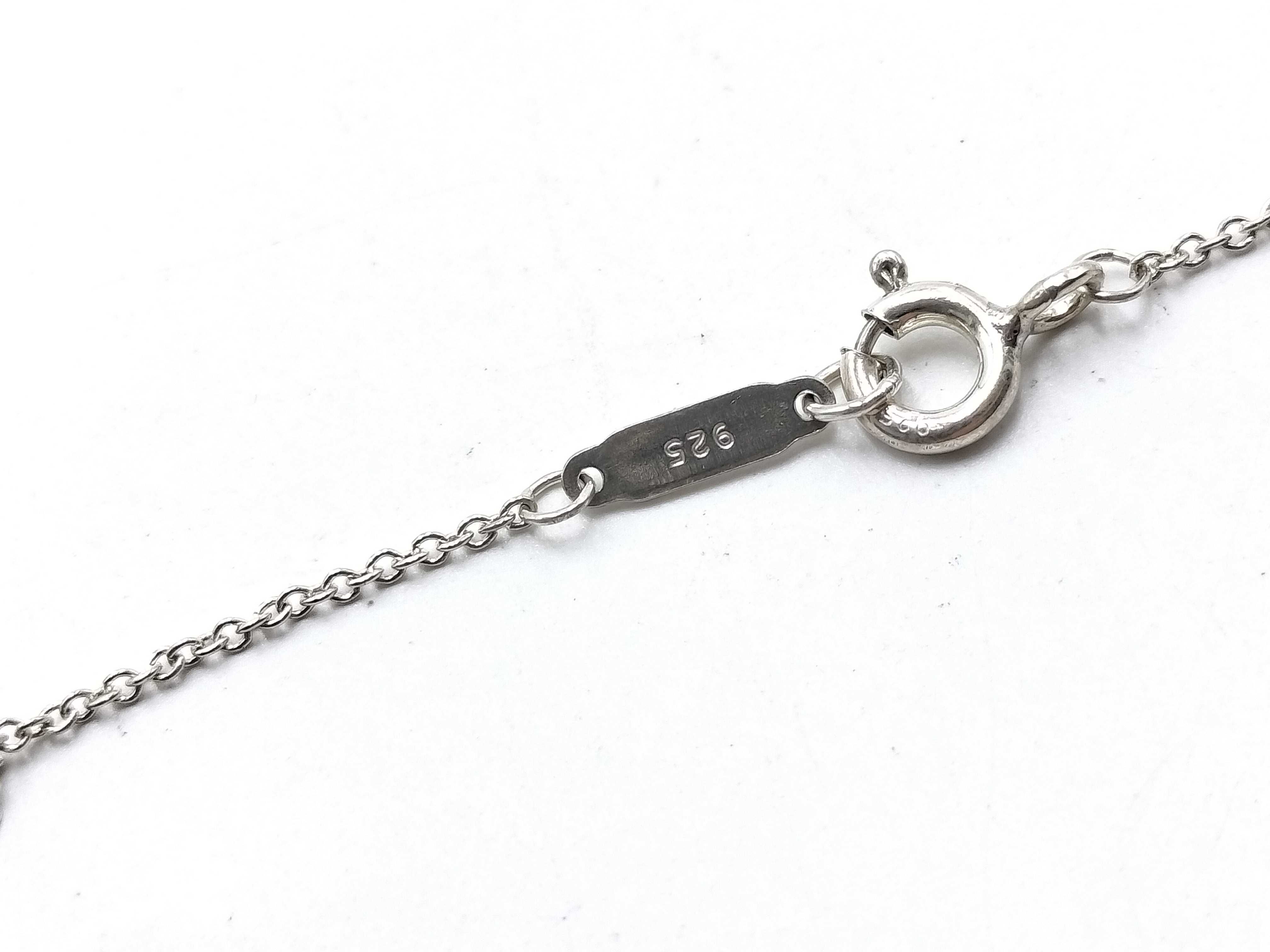 【水曜終了】(10221_0427)Tiffany&Co. インターロッキング ネックレス リング